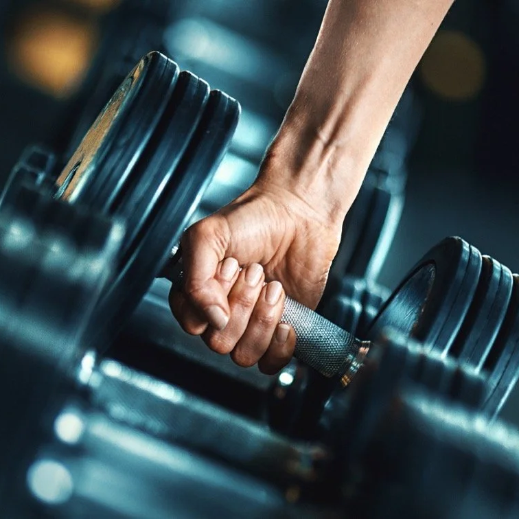 Woman strength training during perimenopause